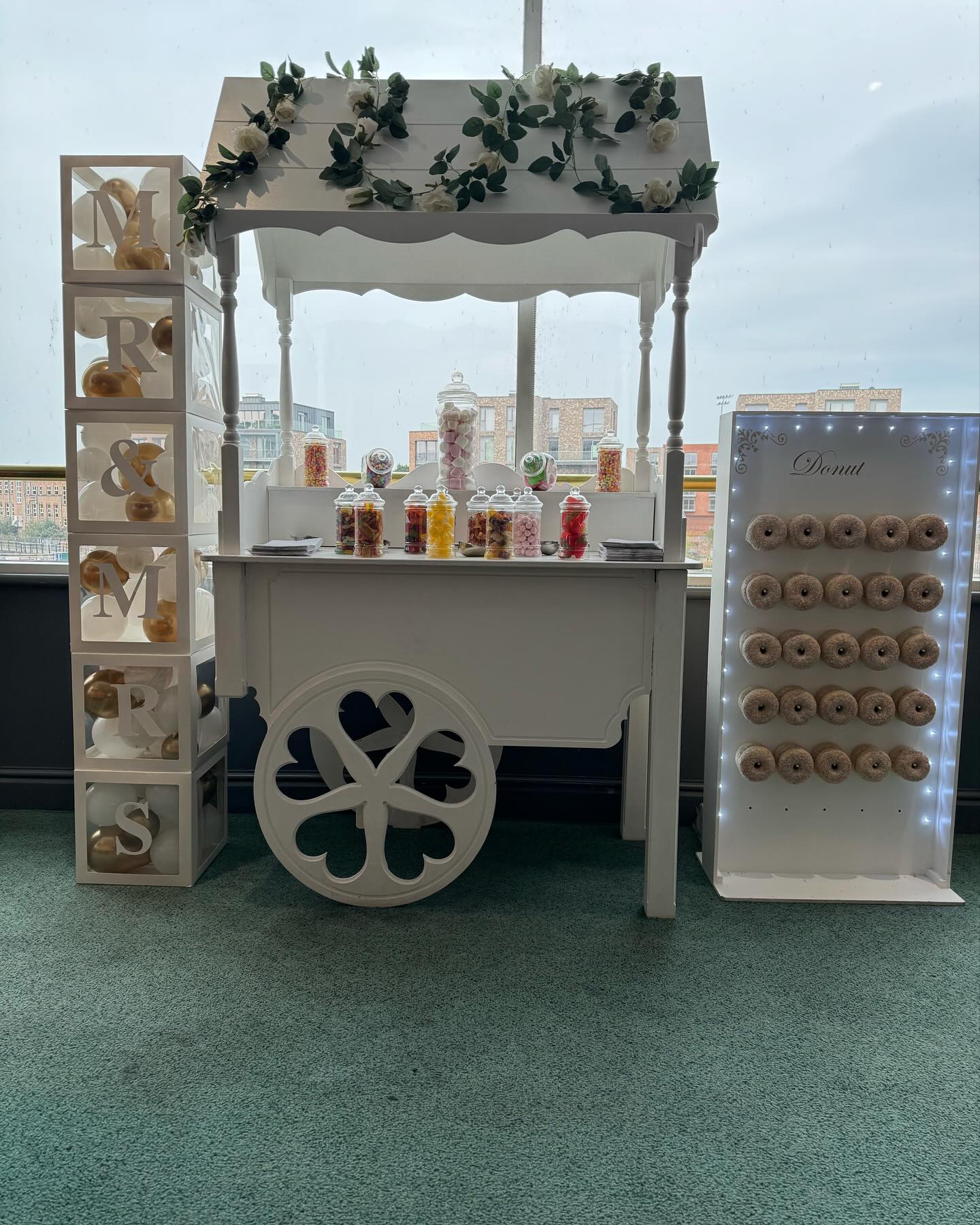 Sweet cart and donut wall